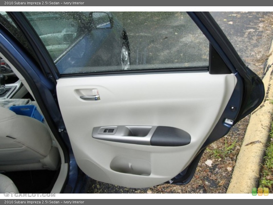 Ivory Interior Door Panel for the 2010 Subaru Impreza 2.5i Sedan #50874589