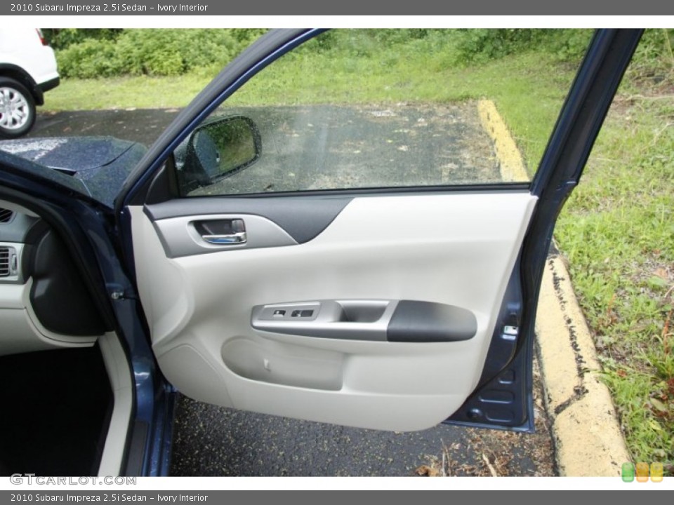 Ivory Interior Door Panel for the 2010 Subaru Impreza 2.5i Sedan #50874622