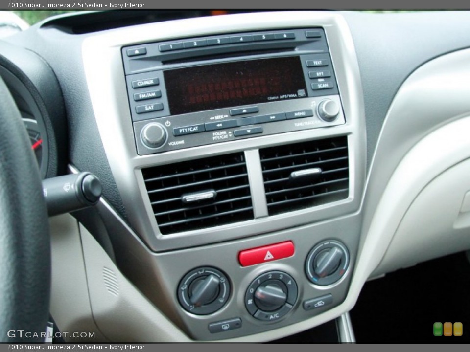 Ivory Interior Controls for the 2010 Subaru Impreza 2.5i Sedan #50874652