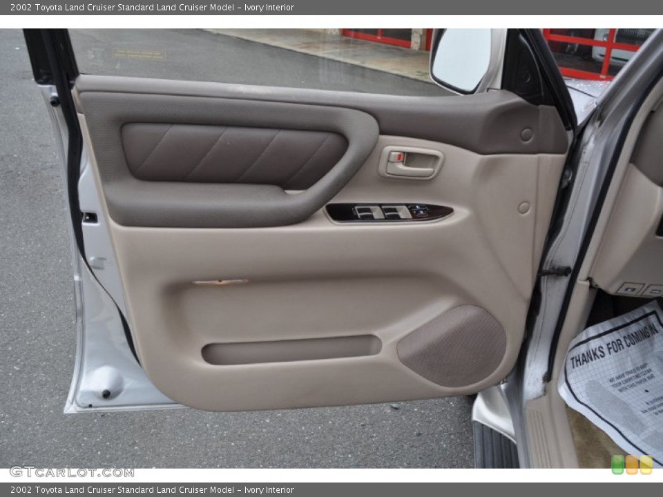 Ivory Interior Door Panel for the 2002 Toyota Land Cruiser  #50887798