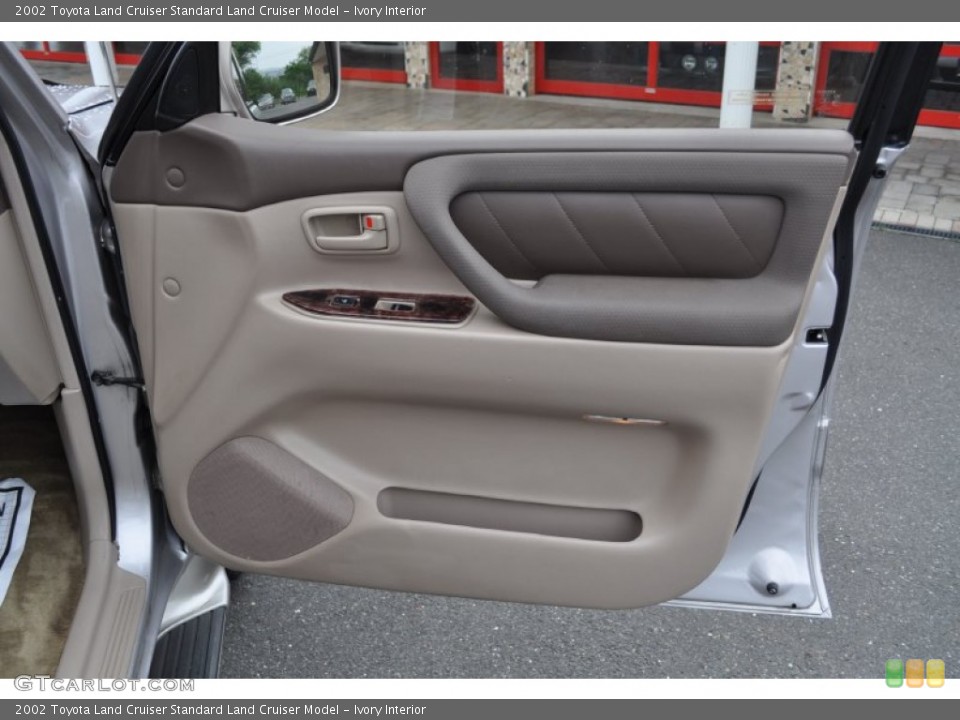 Ivory Interior Door Panel for the 2002 Toyota Land Cruiser  #50887828
