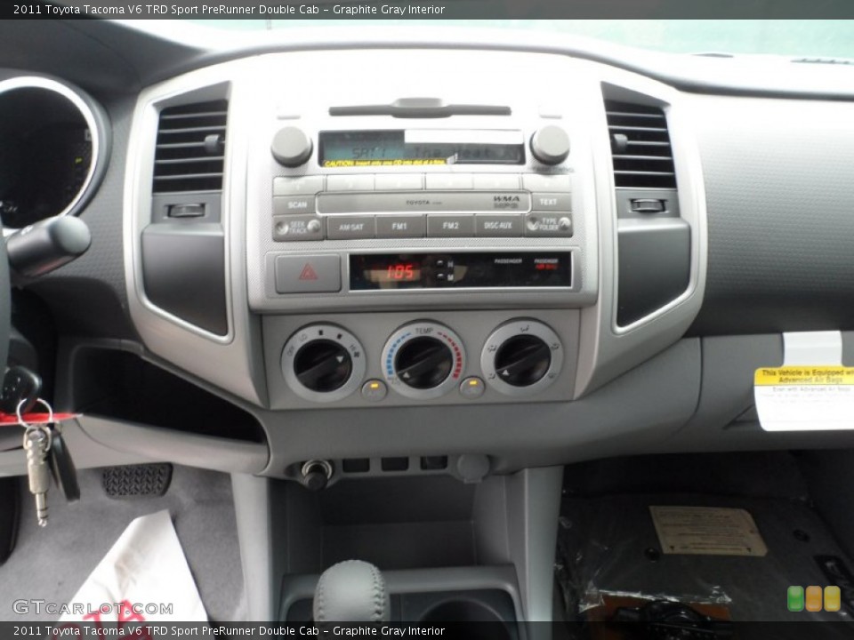 Graphite Gray Interior Controls for the 2011 Toyota Tacoma V6 TRD Sport PreRunner Double Cab #50923362