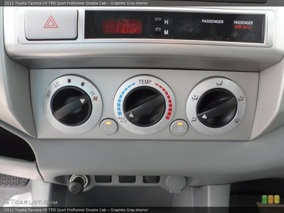 Graphite Gray Interior Controls for the 2011 Toyota Tacoma V6 TRD Sport PreRunner Double Cab #50923398