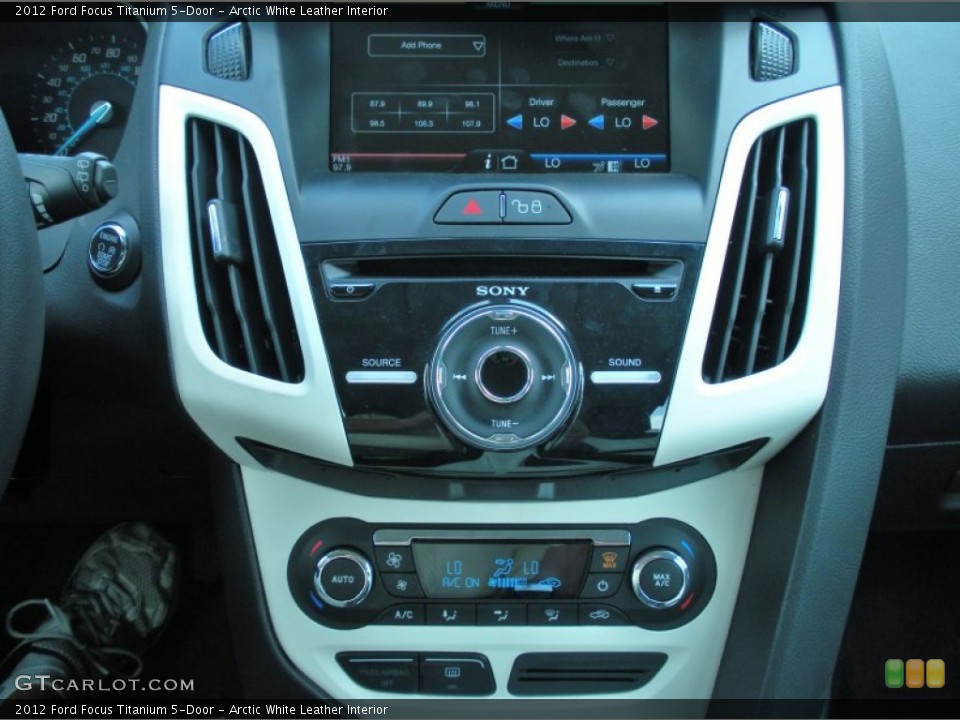 Arctic White Leather Interior Controls for the 2012 Ford Focus Titanium 5-Door #50933205