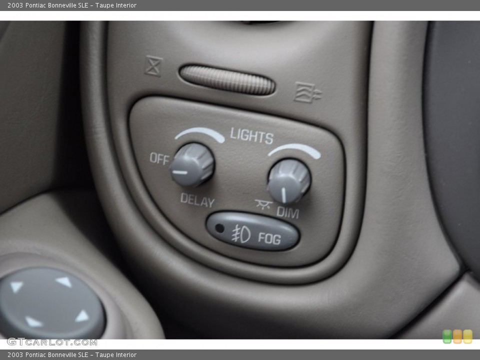 Taupe Interior Controls for the 2003 Pontiac Bonneville SLE #50938884