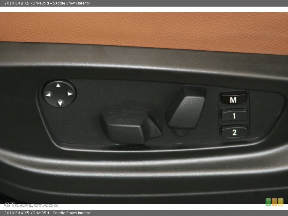 Saddle Brown Interior Controls for the 2010 BMW X5 xDrive35d #50942421