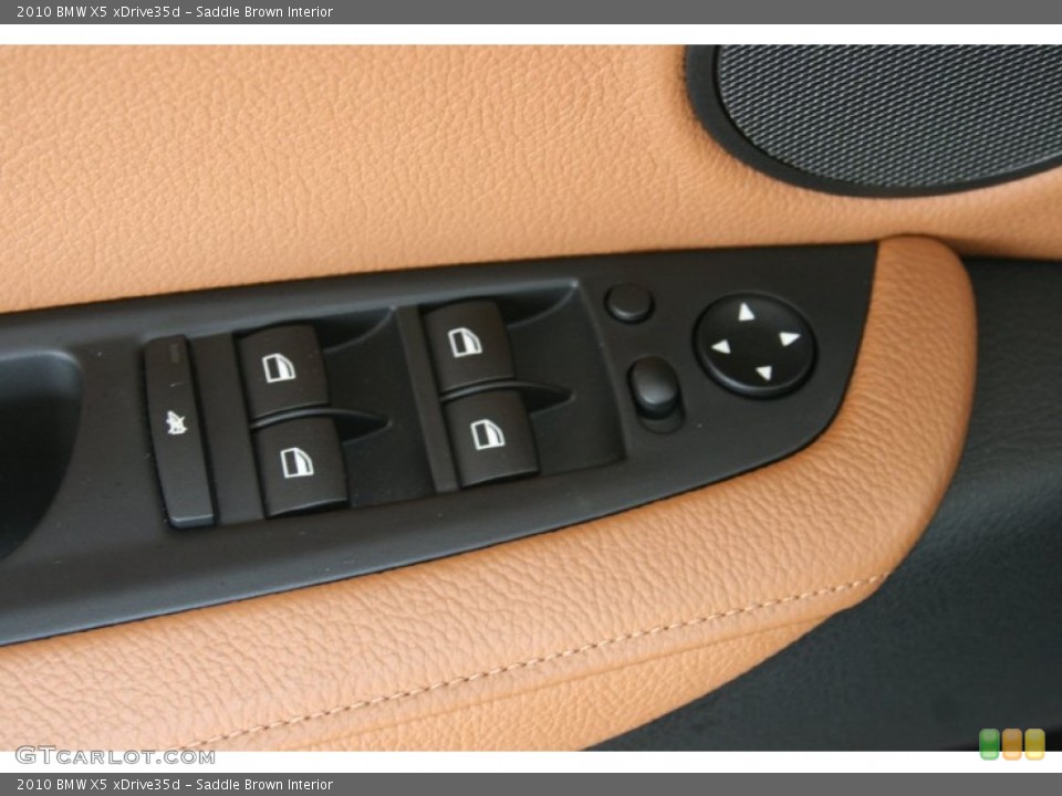Saddle Brown Interior Controls for the 2010 BMW X5 xDrive35d #50942451