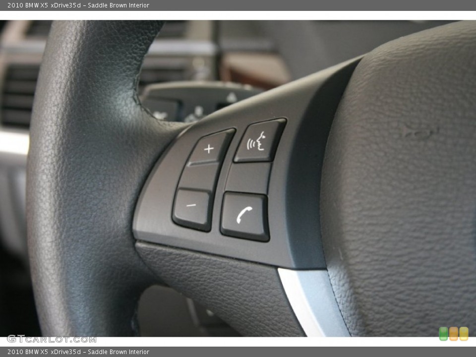 Saddle Brown Interior Controls for the 2010 BMW X5 xDrive35d #50942790