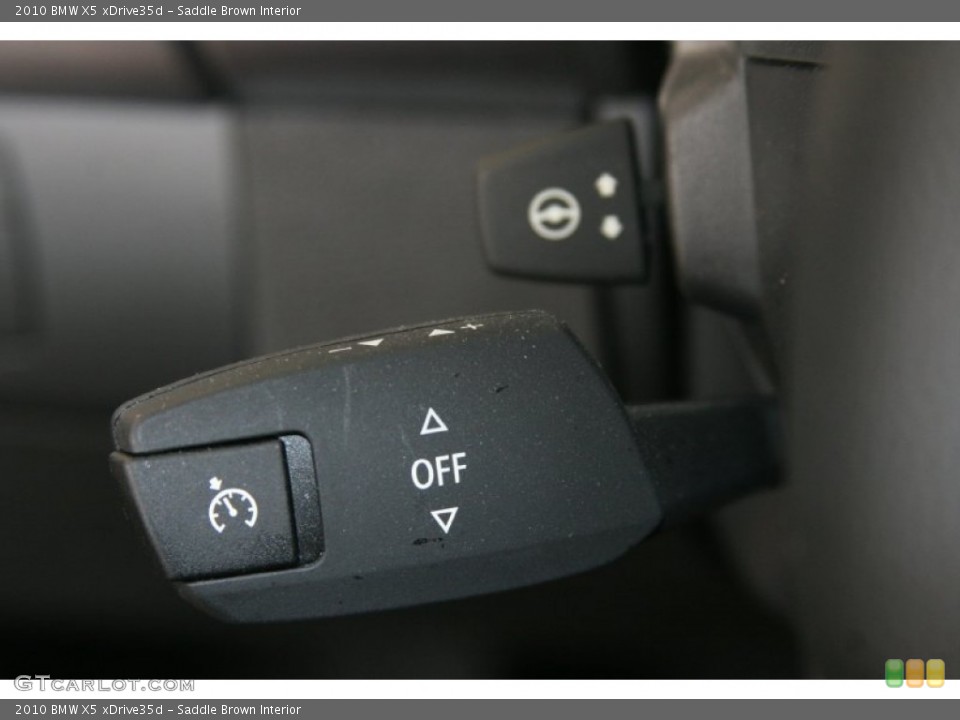 Saddle Brown Interior Controls for the 2010 BMW X5 xDrive35d #50942826