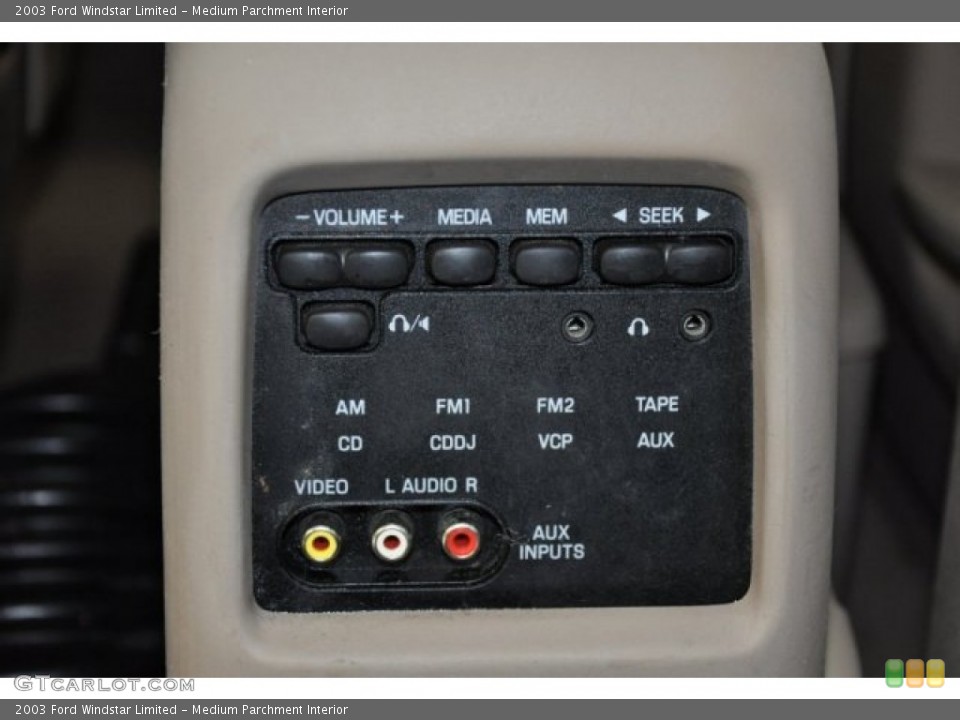 Medium Parchment Interior Controls for the 2003 Ford Windstar Limited #50948103