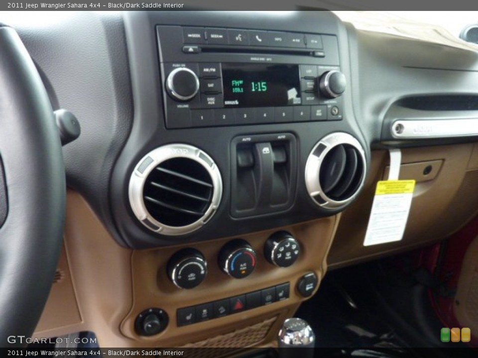 Black/Dark Saddle Interior Controls for the 2011 Jeep Wrangler Sahara 4x4 #50971854