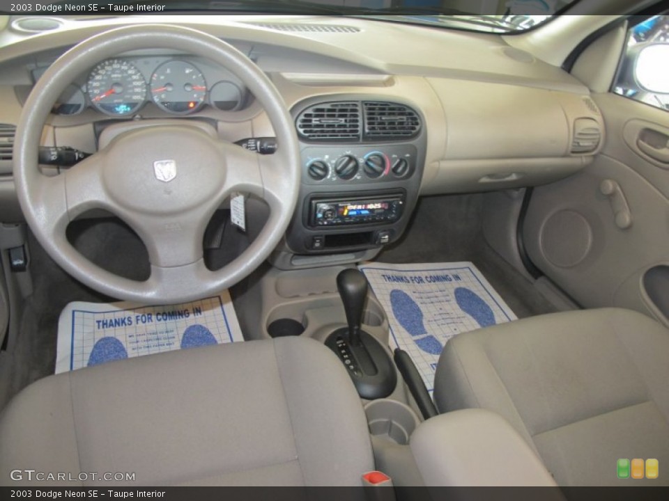 Taupe Interior Dashboard for the 2003 Dodge Neon SE #51024760