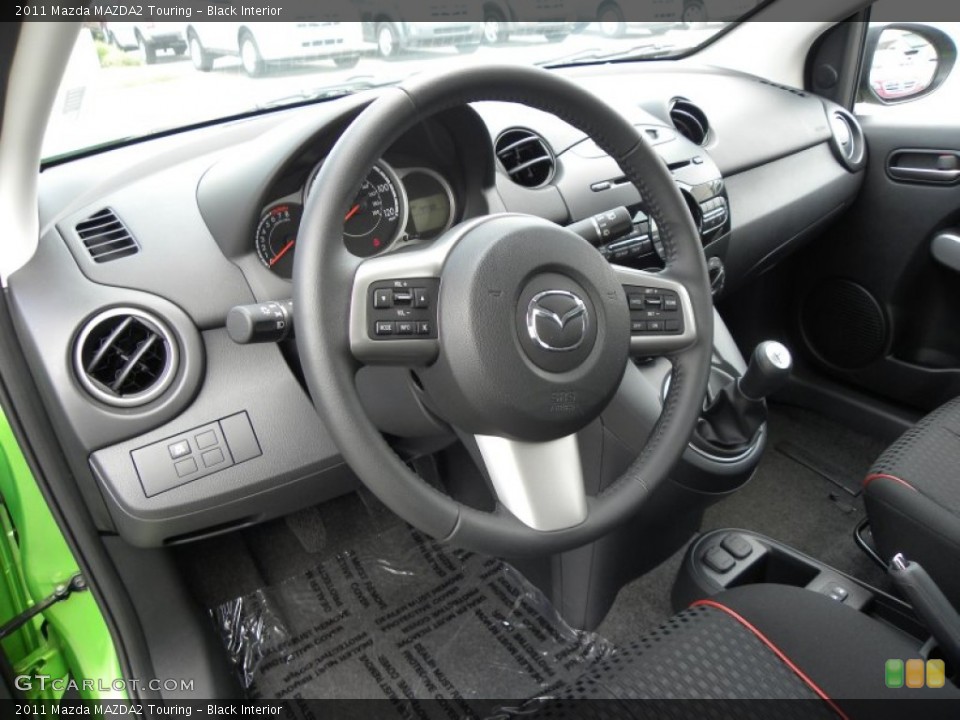 Black Interior Photo for the 2011 Mazda MAZDA2 Touring #51028489