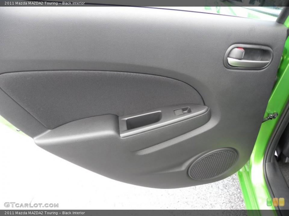 Black Interior Door Panel for the 2011 Mazda MAZDA2 Touring #51028552