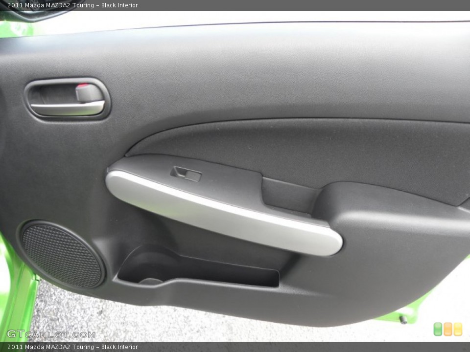 Black Interior Door Panel for the 2011 Mazda MAZDA2 Touring #51028582