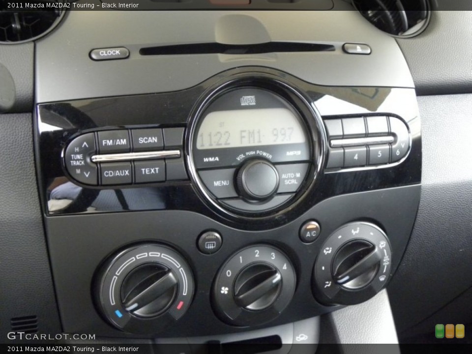 Black Interior Controls for the 2011 Mazda MAZDA2 Touring #51028753
