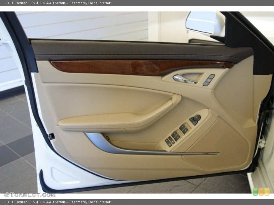 Cashmere/Cocoa Interior Door Panel for the 2011 Cadillac CTS 4 3.6 AWD Sedan #51090719