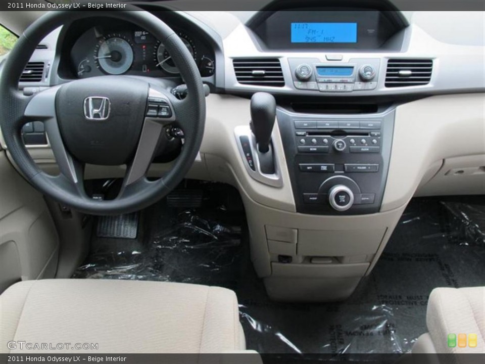 Beige Interior Dashboard for the 2011 Honda Odyssey LX #51099710