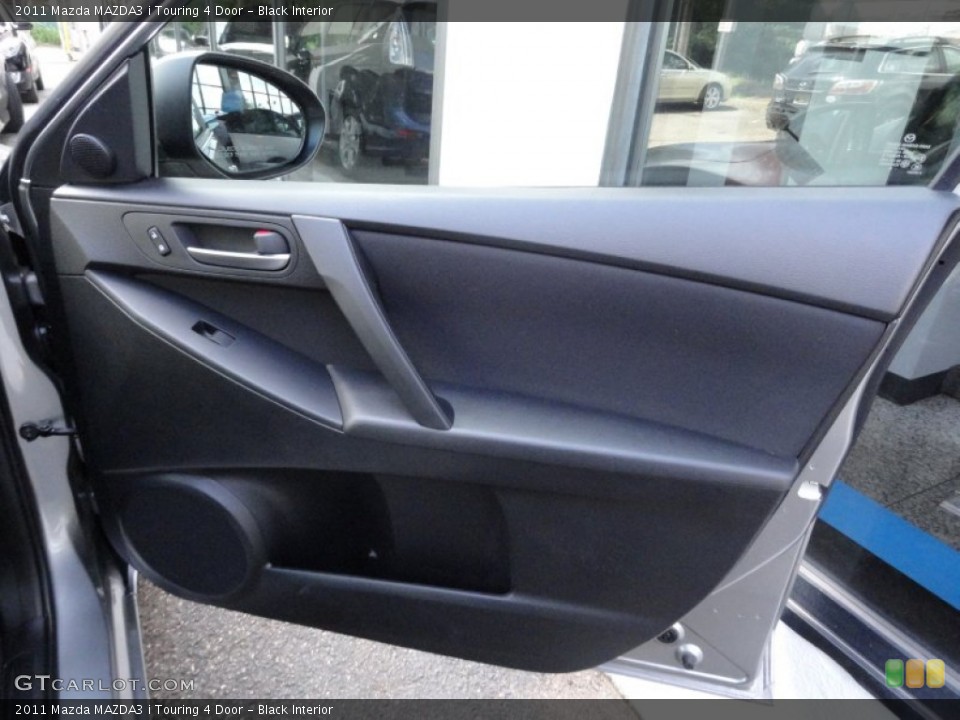 Black Interior Door Panel for the 2011 Mazda MAZDA3 i Touring 4 Door #51150749