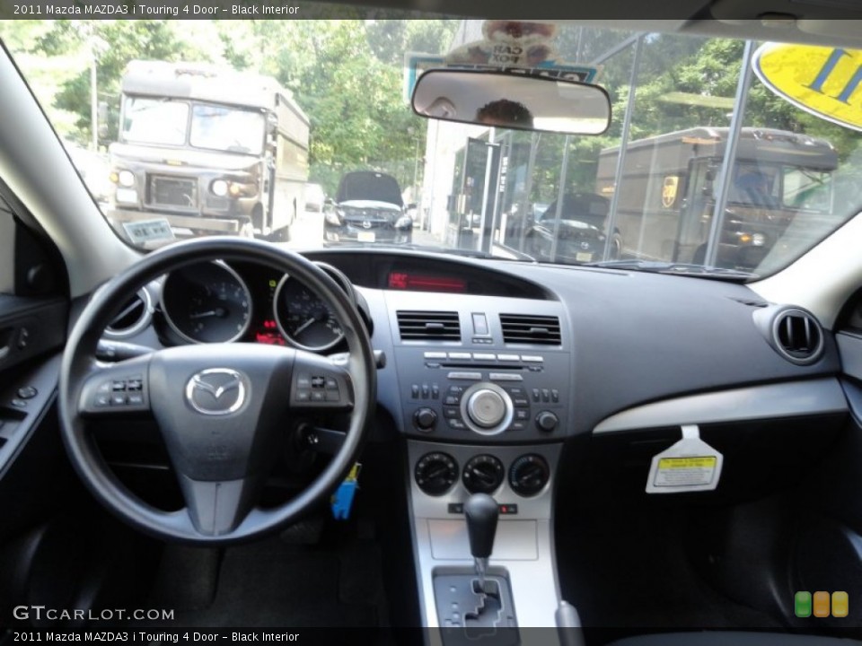 Black Interior Dashboard for the 2011 Mazda MAZDA3 i Touring 4 Door #51150959
