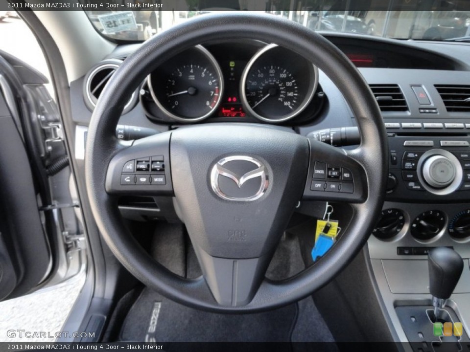 Black Interior Steering Wheel for the 2011 Mazda MAZDA3 i Touring 4 Door #51150977