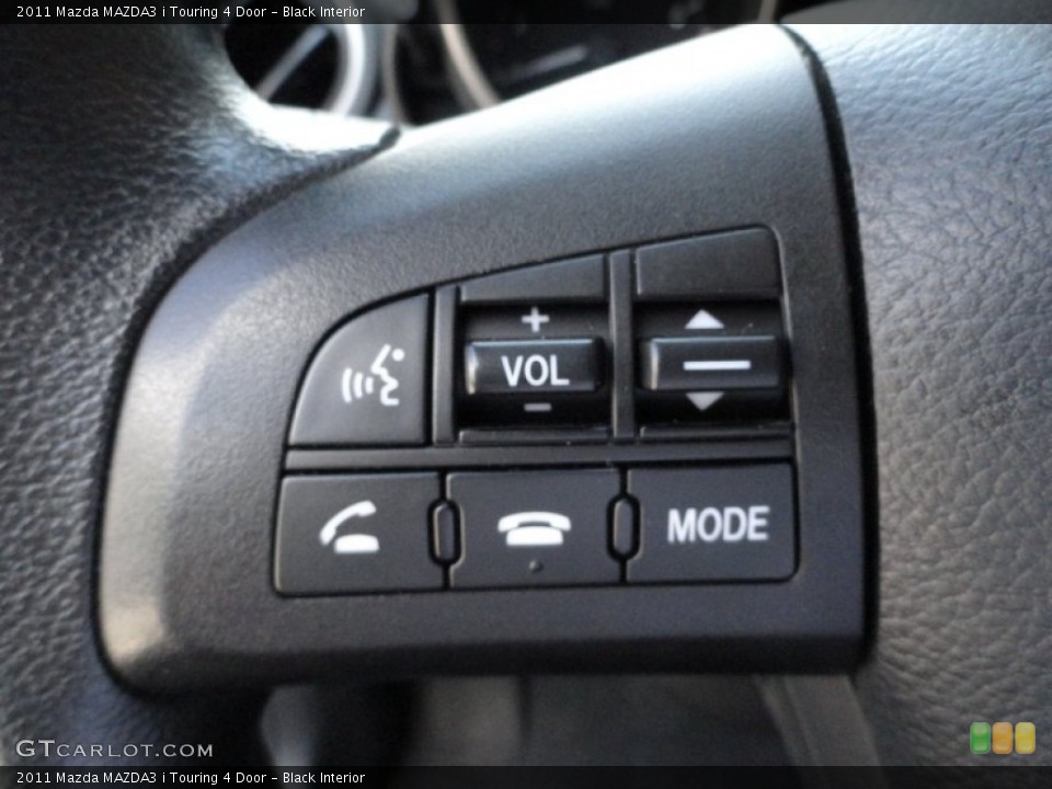 Black Interior Controls for the 2011 Mazda MAZDA3 i Touring 4 Door #51150986