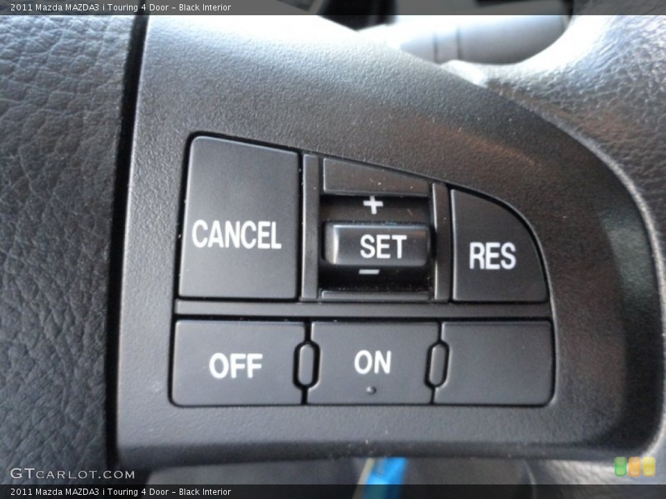 Black Interior Controls for the 2011 Mazda MAZDA3 i Touring 4 Door #51150992