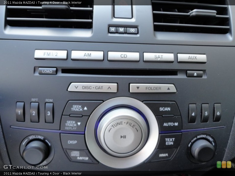 Black Interior Controls for the 2011 Mazda MAZDA3 i Touring 4 Door #51151058