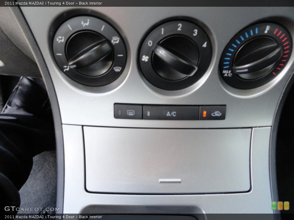 Black Interior Controls for the 2011 Mazda MAZDA3 i Touring 4 Door #51151064