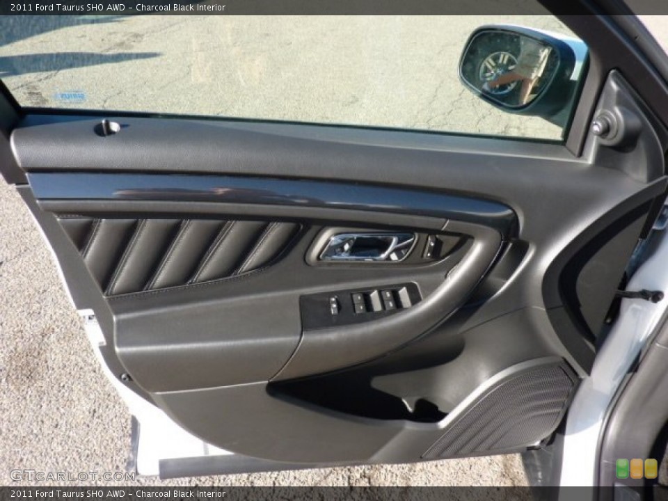 Charcoal Black Interior Door Panel for the 2011 Ford Taurus SHO AWD #51172065
