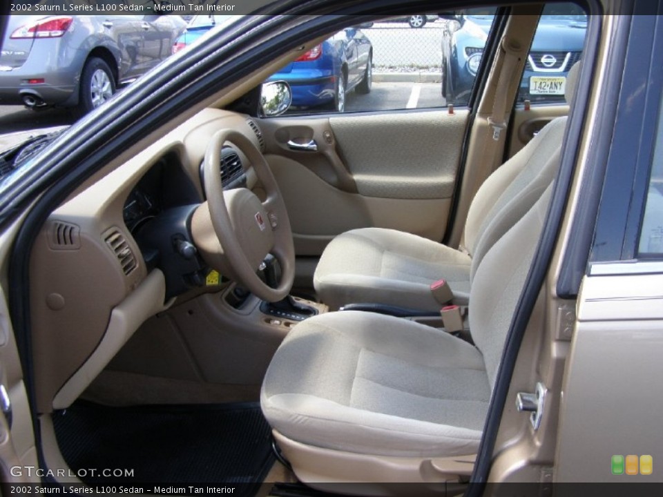 Medium Tan Interior Photo for the 2002 Saturn L Series L100 Sedan #51177963