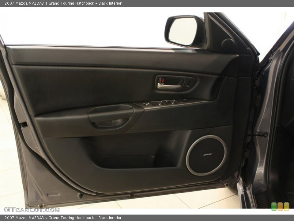 Black Interior Door Panel for the 2007 Mazda MAZDA3 s Grand Touring Hatchback #51188172
