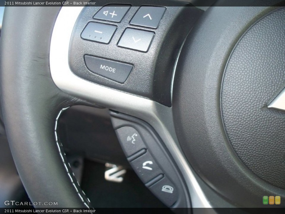 Black Interior Controls for the 2011 Mitsubishi Lancer Evolution GSR #51205820