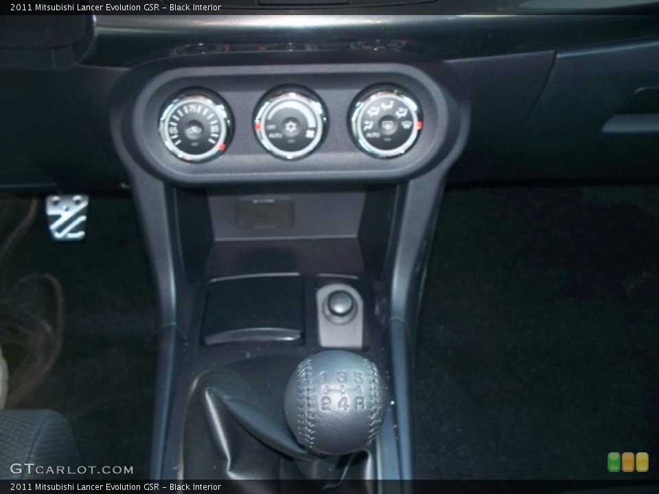 Black Interior Controls for the 2011 Mitsubishi Lancer Evolution GSR #51205877