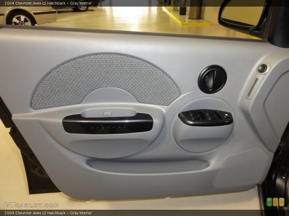 Gray Interior Door Panel for the 2004 Chevrolet Aveo LS Hatchback #51206526