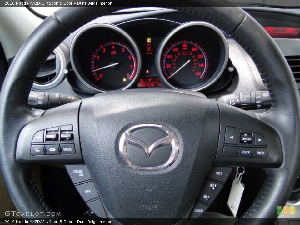 Dune Beige Interior Steering Wheel for the 2010 Mazda MAZDA3 s Sport 5 Door #51220829