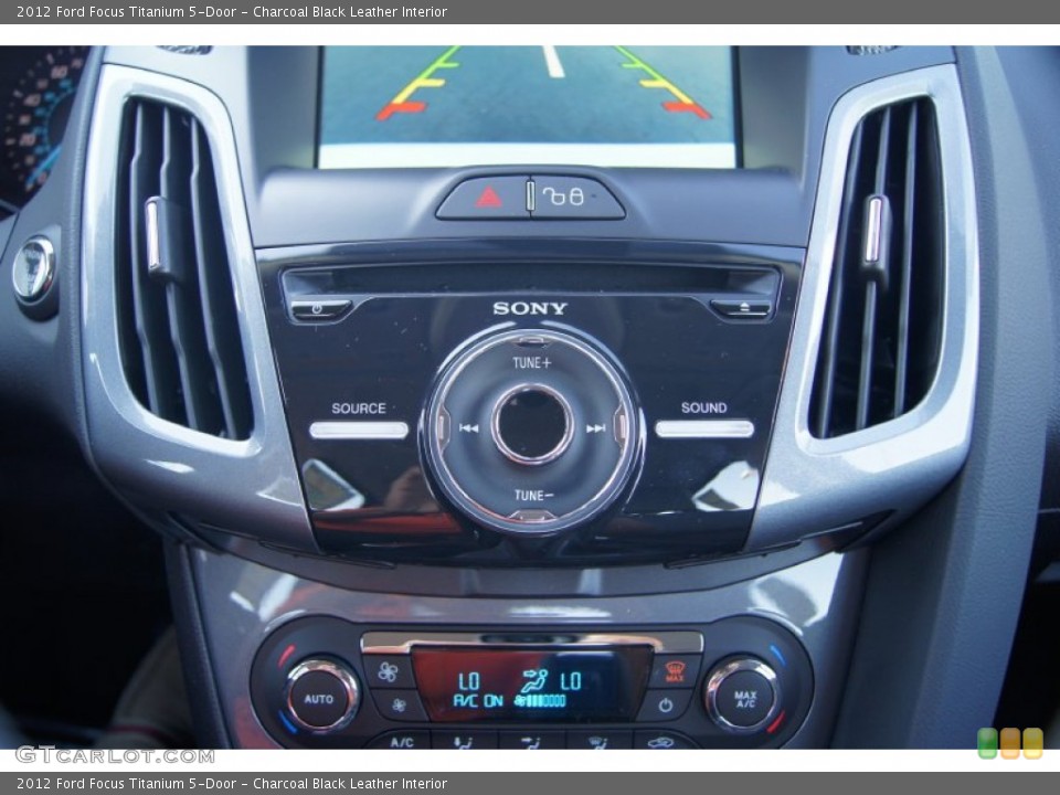 Charcoal Black Leather Interior Controls for the 2012 Ford Focus Titanium 5-Door #51225251
