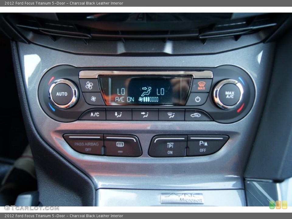 Charcoal Black Leather Interior Controls for the 2012 Ford Focus Titanium 5-Door #51225263