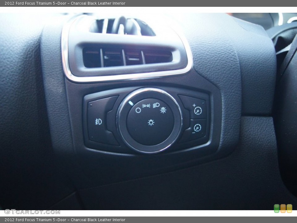 Charcoal Black Leather Interior Controls for the 2012 Ford Focus Titanium 5-Door #51225332