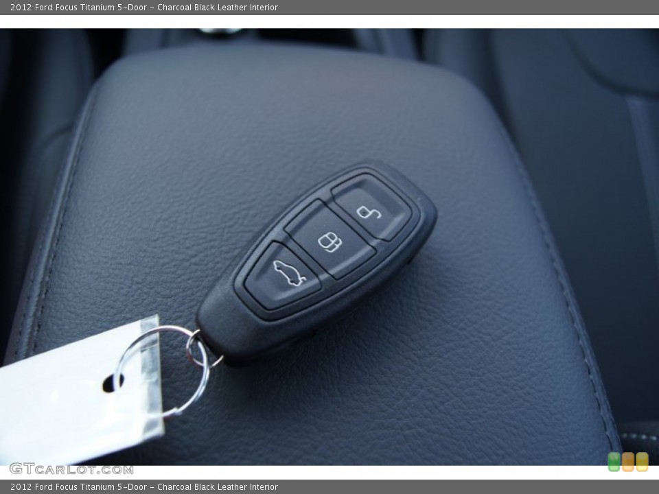Charcoal Black Leather Interior Controls for the 2012 Ford Focus Titanium 5-Door #51225344