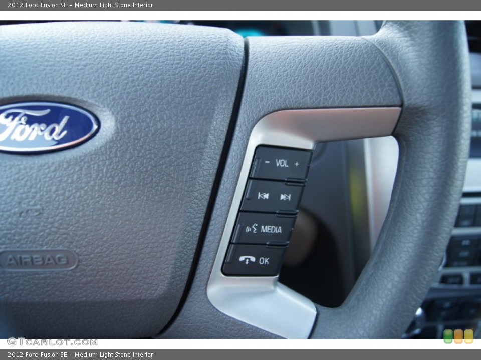 Medium Light Stone Interior Controls for the 2012 Ford Fusion SE #51225659