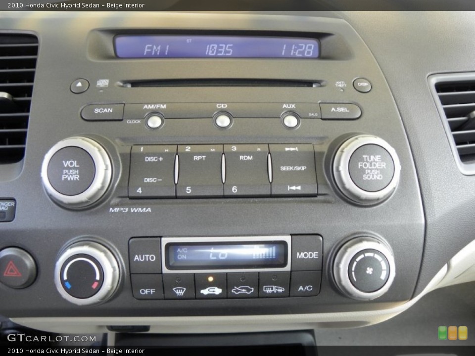 Beige Interior Controls for the 2010 Honda Civic Hybrid Sedan #51234491