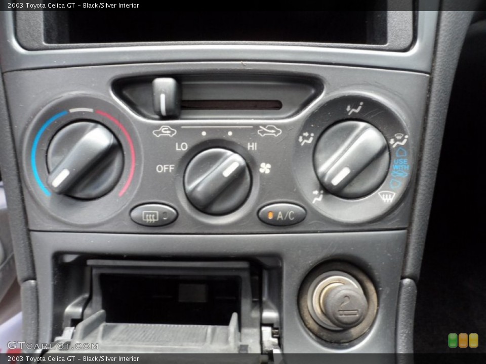 Black/Silver Interior Controls for the 2003 Toyota Celica GT #51274963