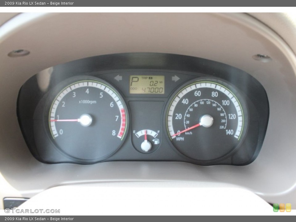 Beige Interior Gauges for the 2009 Kia Rio LX Sedan #51276346