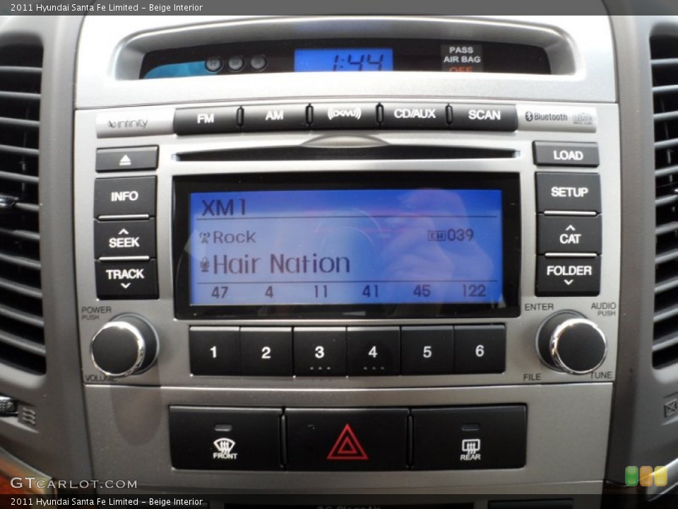 Beige Interior Controls for the 2011 Hyundai Santa Fe Limited #51311908