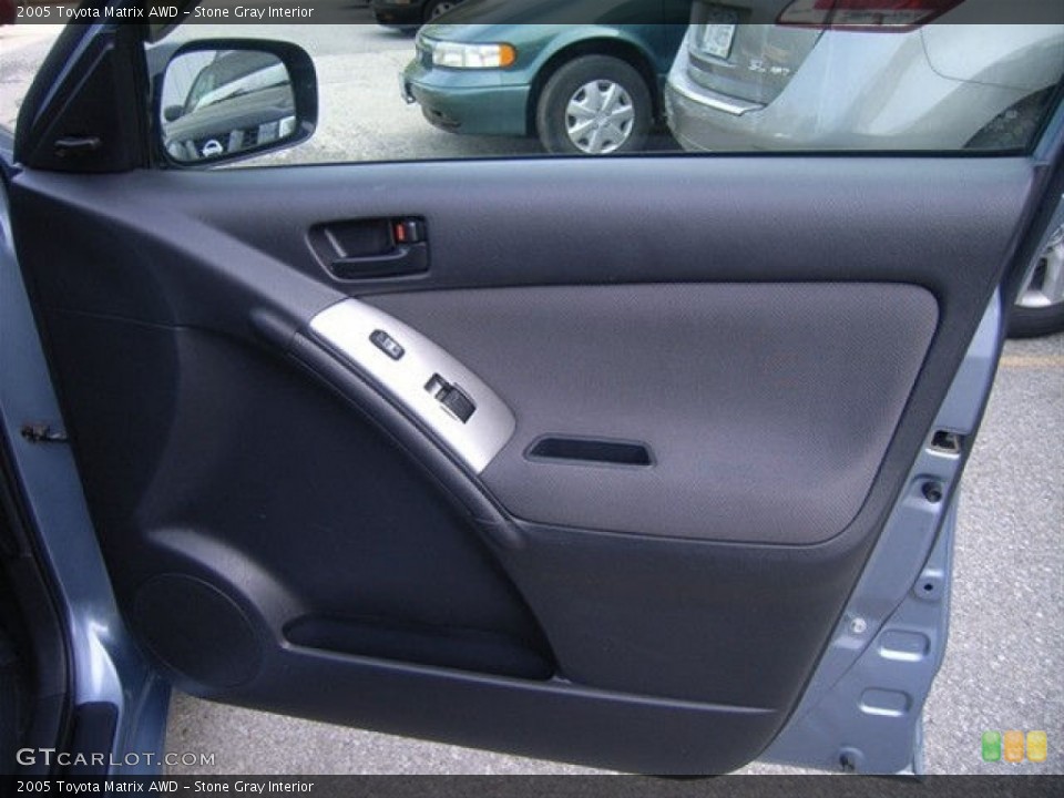 Stone Gray Interior Door Panel for the 2005 Toyota Matrix AWD #51350426