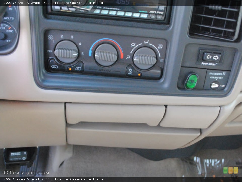 Tan Interior Controls for the 2002 Chevrolet Silverado 2500 LT Extended Cab 4x4 #51440835