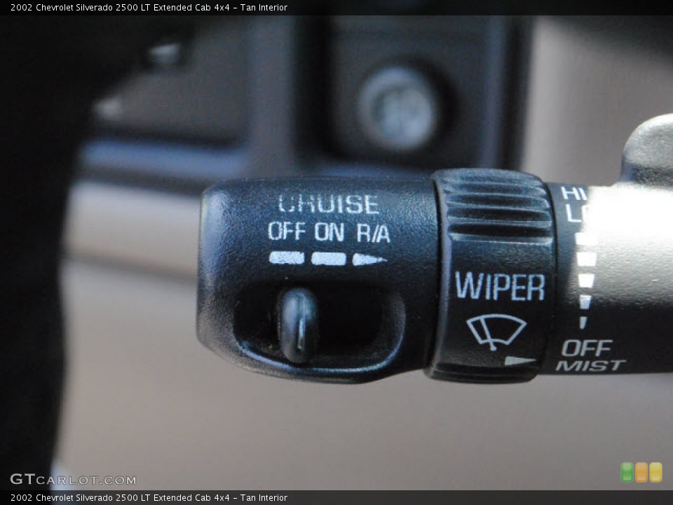 Tan Interior Controls for the 2002 Chevrolet Silverado 2500 LT Extended Cab 4x4 #51440865