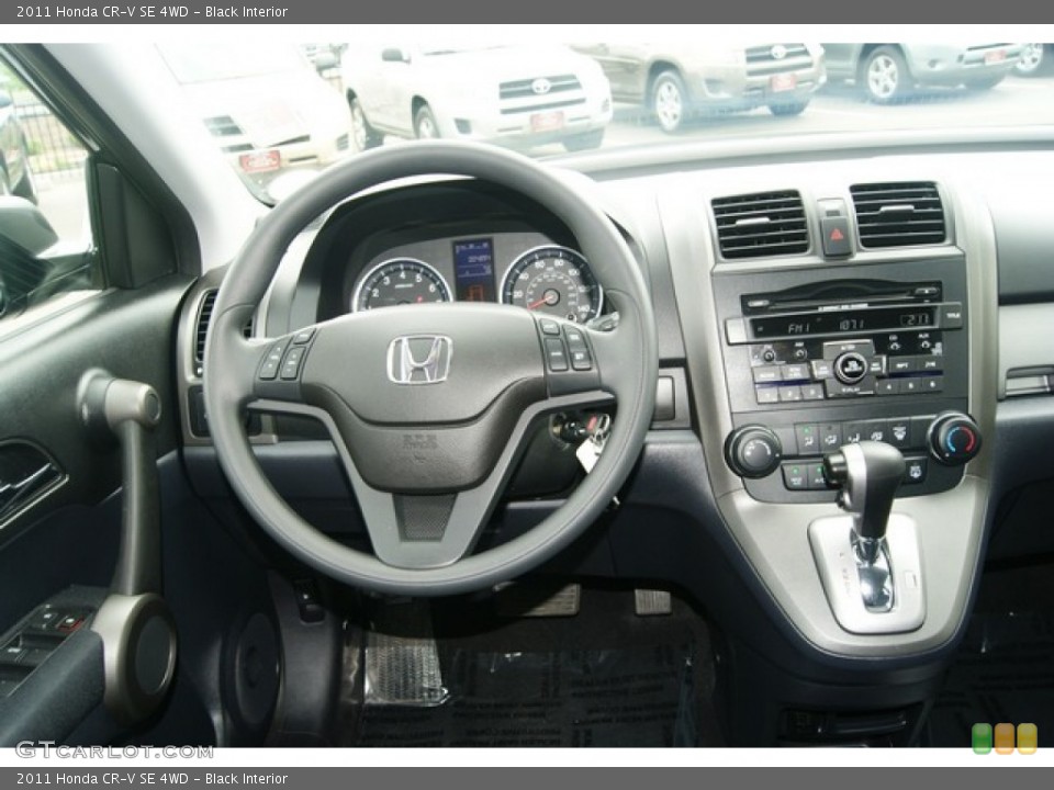 Black Interior Dashboard for the 2011 Honda CR-V SE 4WD #51443970