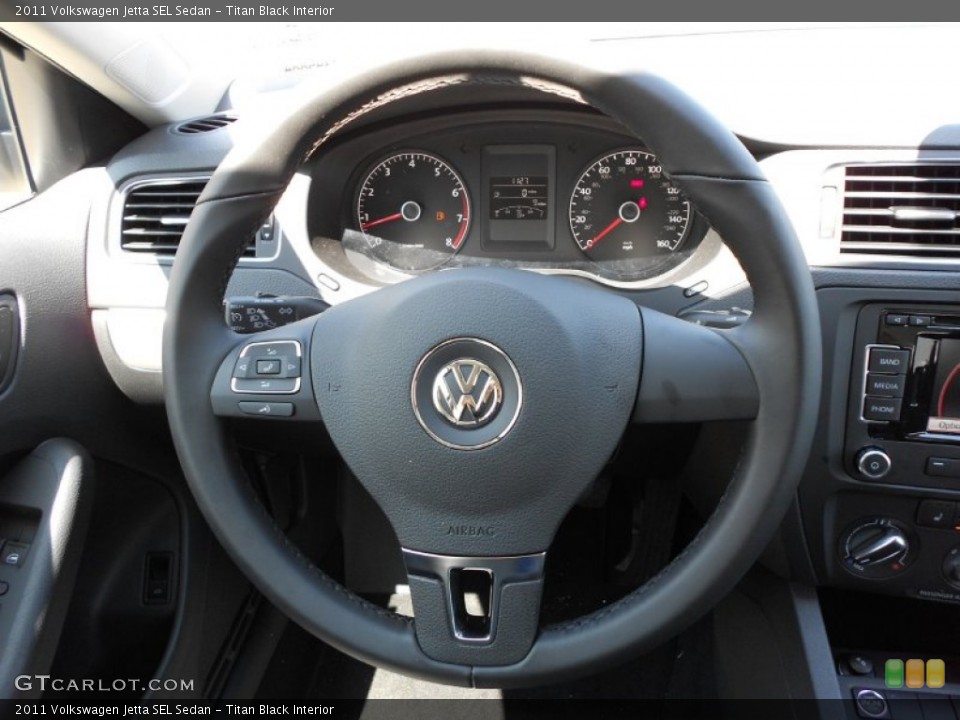 Titan Black Interior Steering Wheel for the 2011 Volkswagen Jetta SEL Sedan #51461064